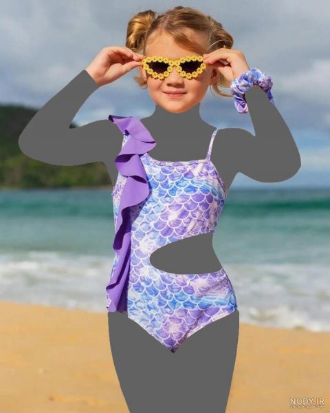  عکس زن در ساحل با مایو