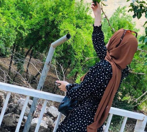  ژست عکس کنار دریا دخترانه با حجاب