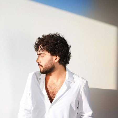  عکس پسر بچه خوشگل چشم رنگی مو فرفری