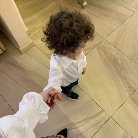  عکس پسر بچه خوشگل چشم رنگی مو فرفری