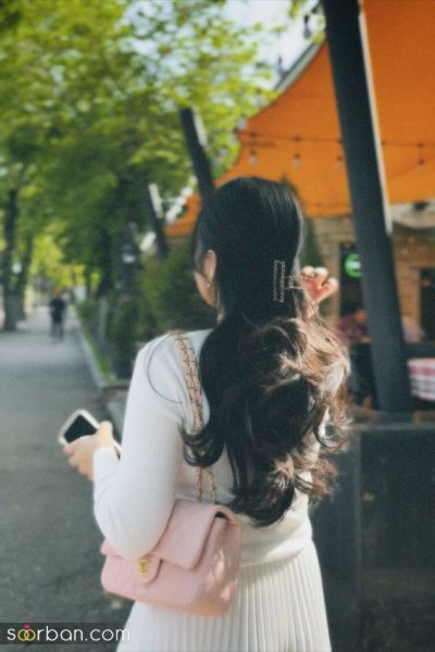  عکس دختر از پشت سر کنار دریا