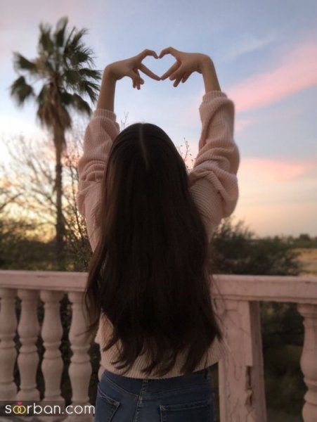  عکس دختر از پشت سر کنار دریا