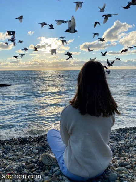  عکس دختر از پشت سر کنار دریا