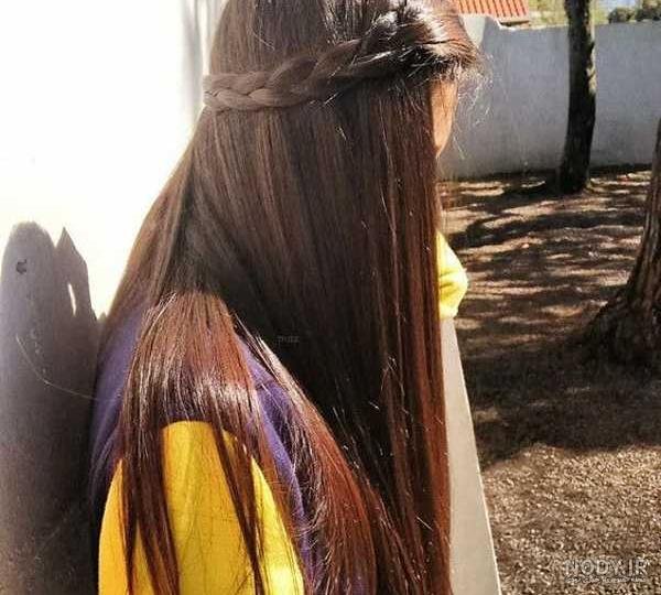 عکس دختر از پشت سر با موهای باز مشکی