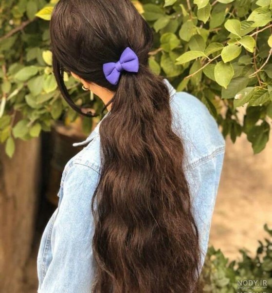  عکس دختر از پشت سر با موهای باز مشکی