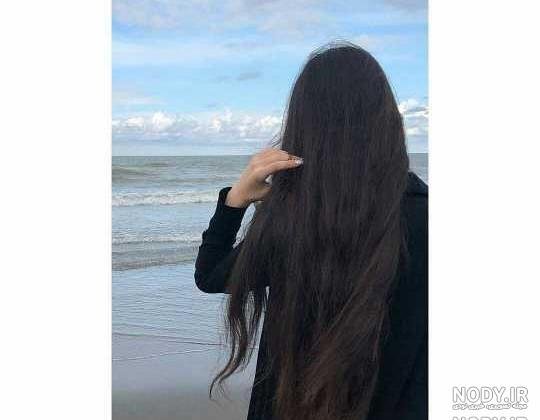  عکس دختر از پشت سر با موهای باز مشکی