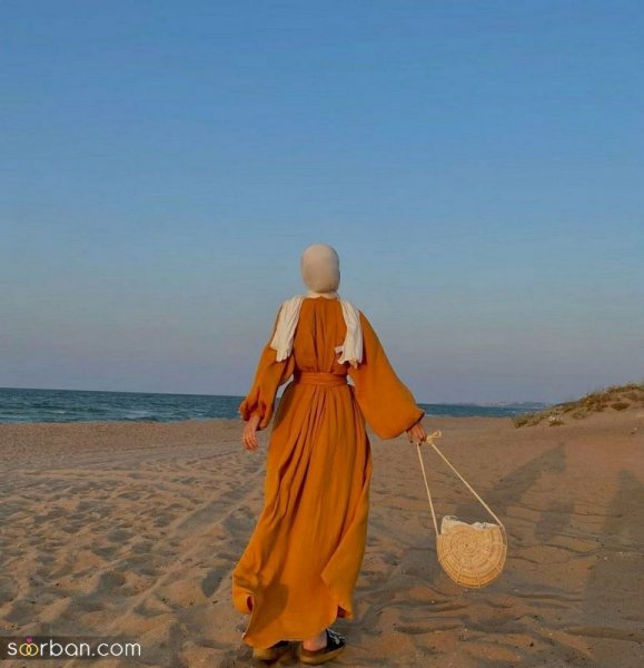  عکس دختر کنار دریا با مانتو