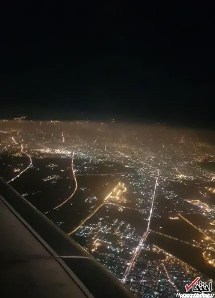  عکس از پنجره هواپیما در شب تهران
