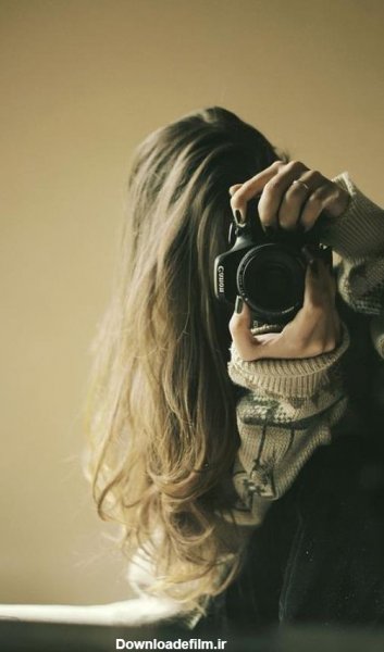 عکس دختر با دوربین عکاسی