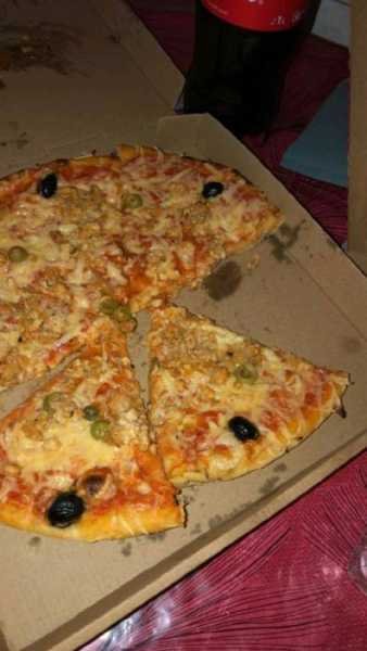  عکس پیتزا در رستوران