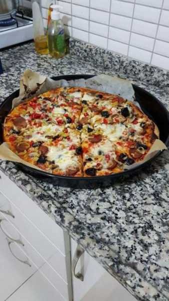  عکس پیتزا در رستوران