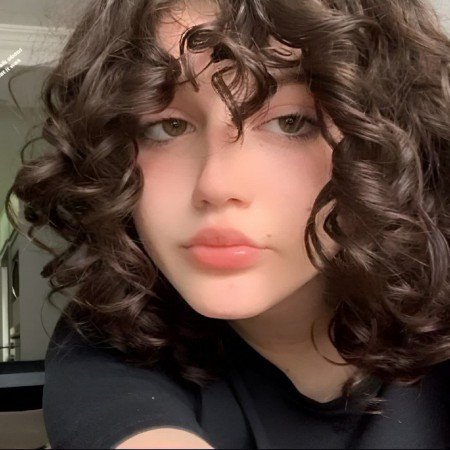  عکس دختر مو فرفری بچه