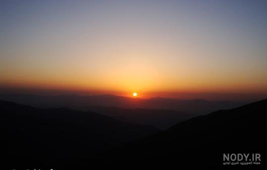  تصویر زمینه کوه برفی و غروب آفتاب