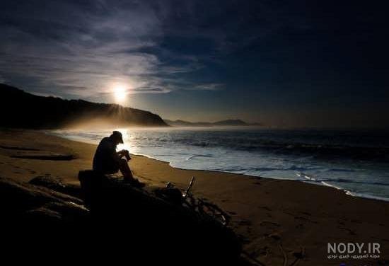 عکس پسر کنار دریا