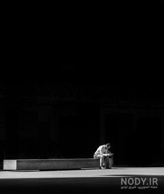 عکس مرد تنها در غروب