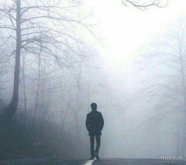عکس مرد تنها در غروب