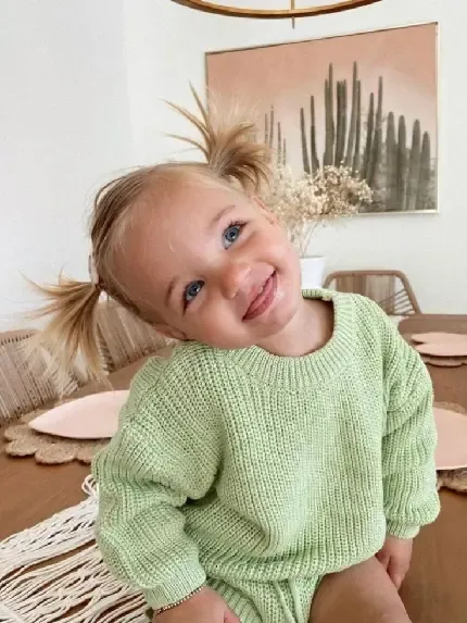  عکس دختر بچه چشم آبی با موهای طلایی