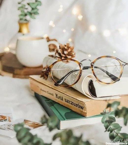 عکس دختر با عینک دودی با حجاب