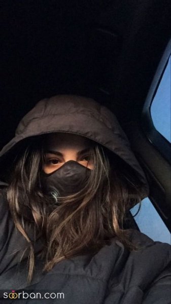 عکس دختر با ماسک و کلاه