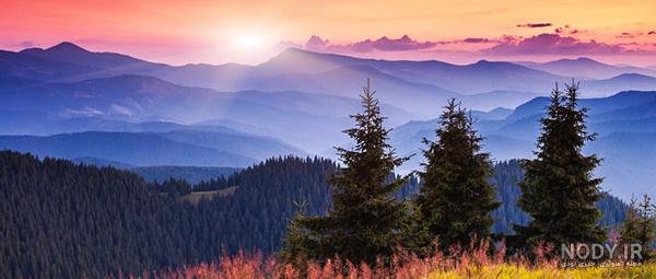 عکس طلوع خورشید از پشت پنجره