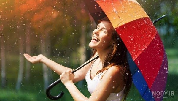  عکس دختر زیر باران شاد