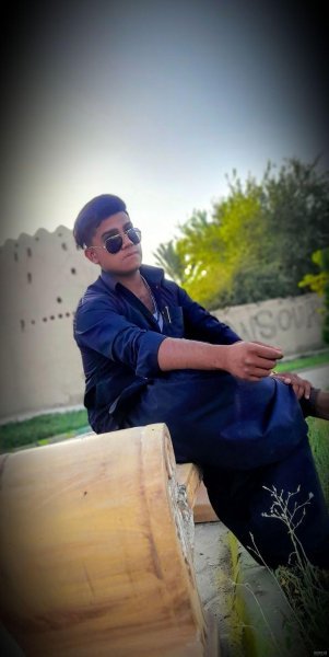 عکس پسر بلوچ با تفنگ