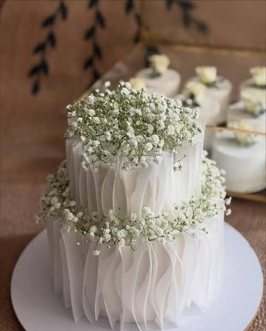  عکس کیک چند طبقه با تزئین گل برای عروسی