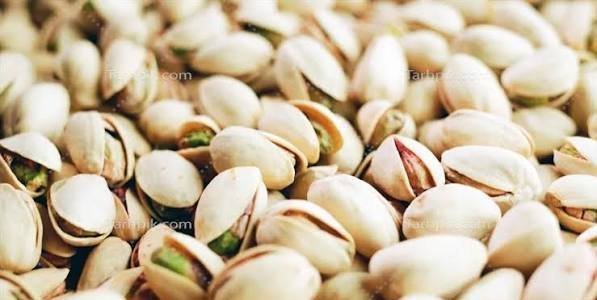  عکس والپیپر بشقاب پر از پسته لاکچری
